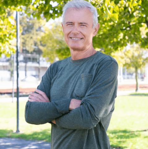 Sample profile concept of a smiling mature man outdoors