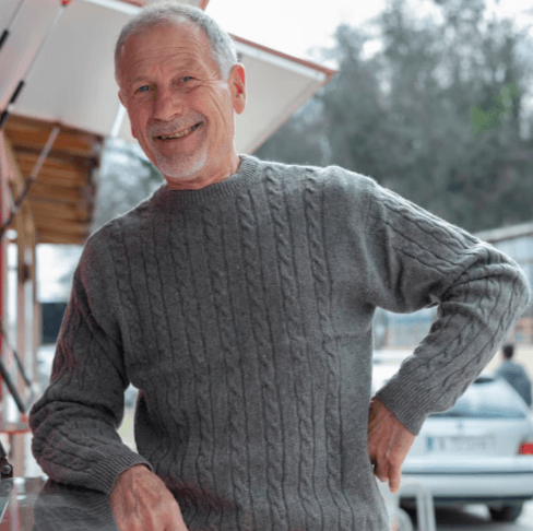Sample profile concept of a mature man in a gray sweater