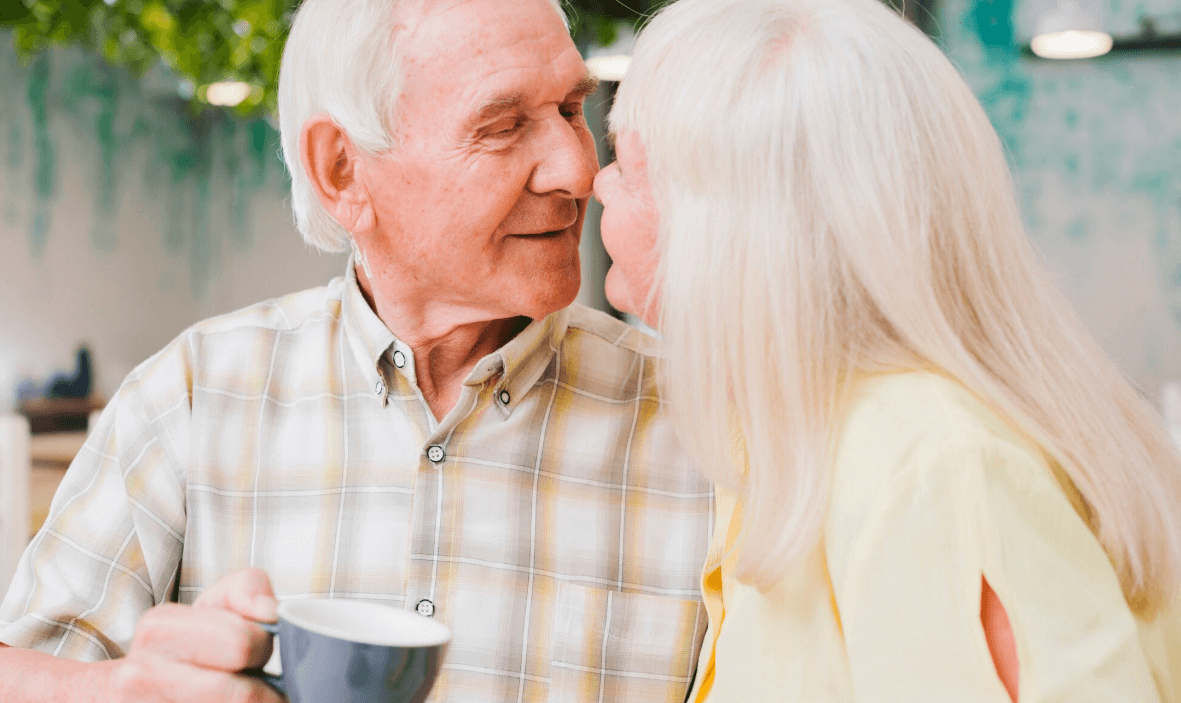 Mature couple sharing a pleasant conversation together