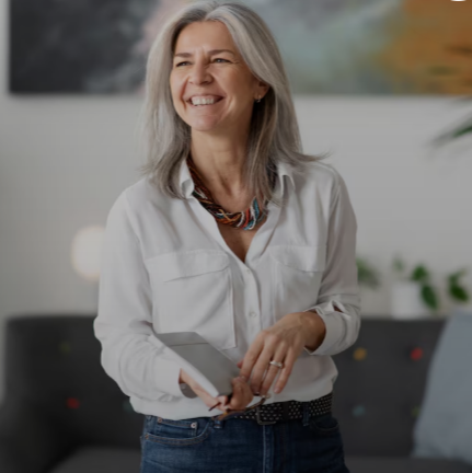 Mature woman smiling in a natural portrait setting